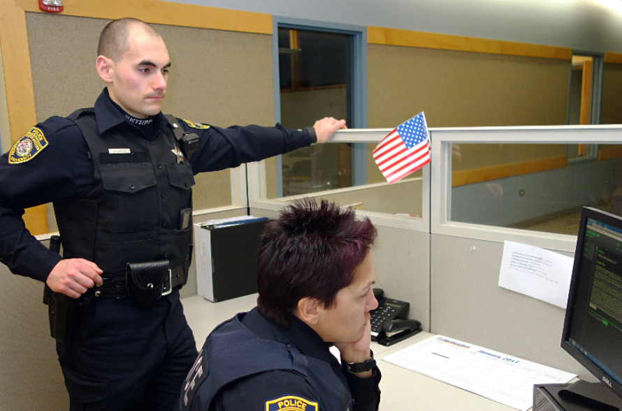 Field Training Officer Garcia reviewing Eversole's Report